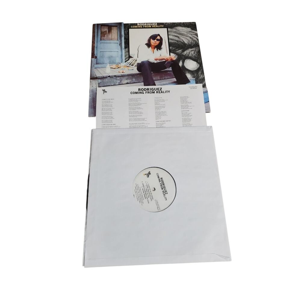 LP Rodriguez Coming From Reality Gatefold Die-cut Jacket + Booklet